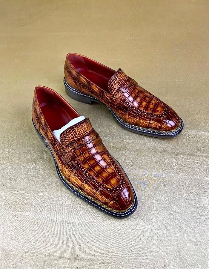 Tan burnished toe penny loafers