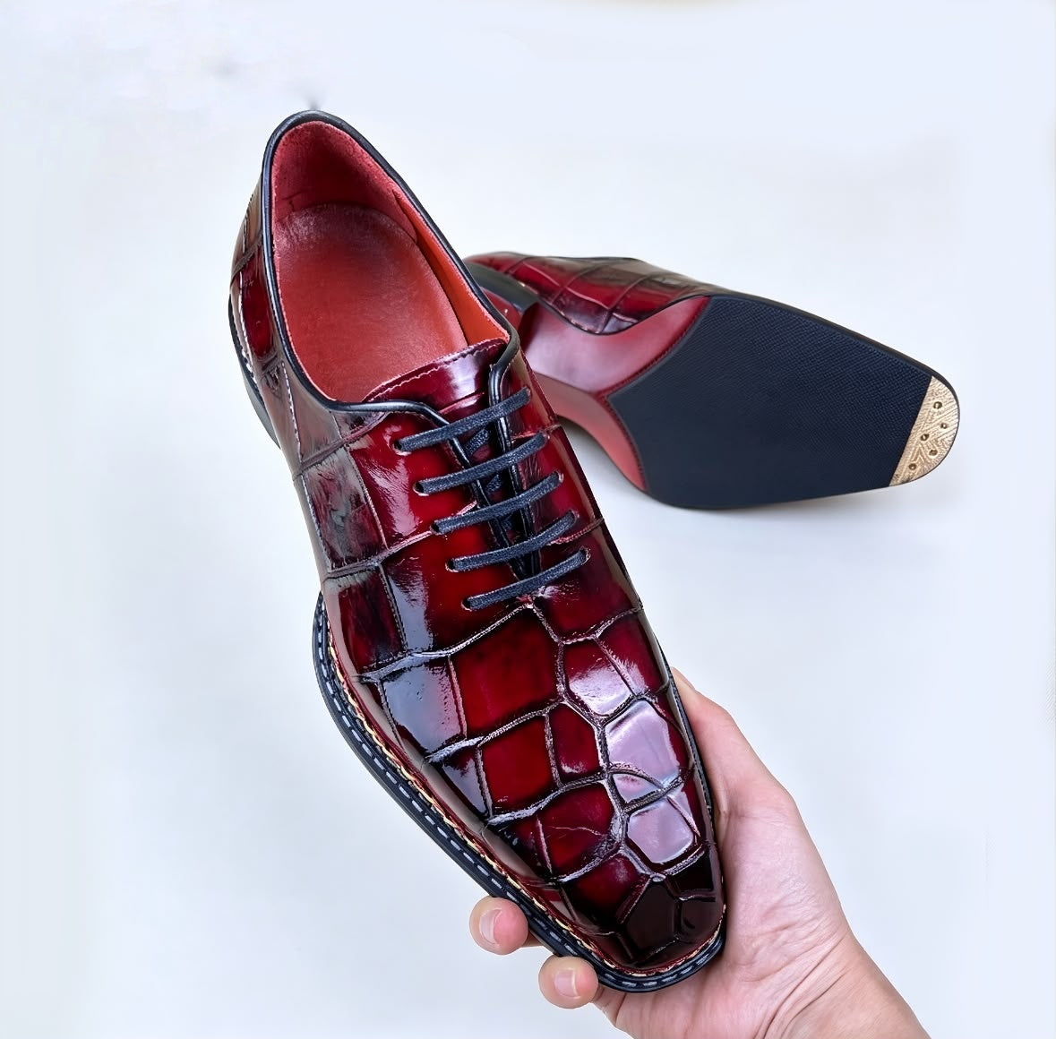Hand-Finished Glossy Exotics with Contrast Stitching and Rich Red Lining